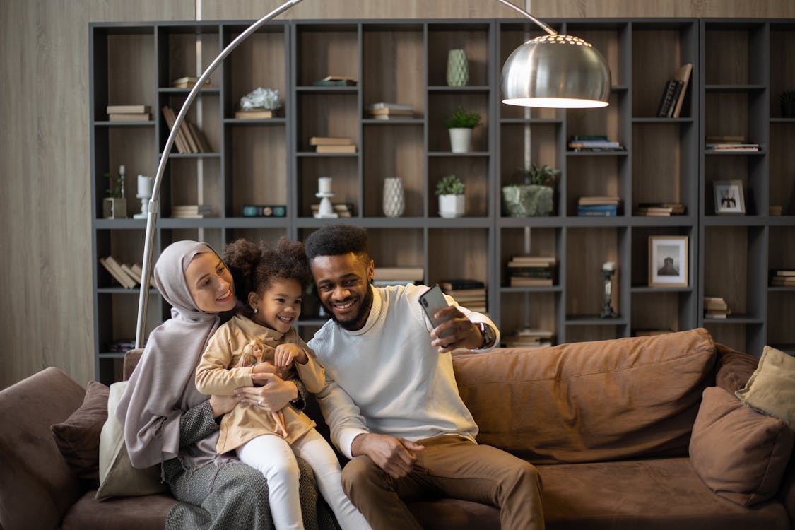 Family relaxing comfortably in their home